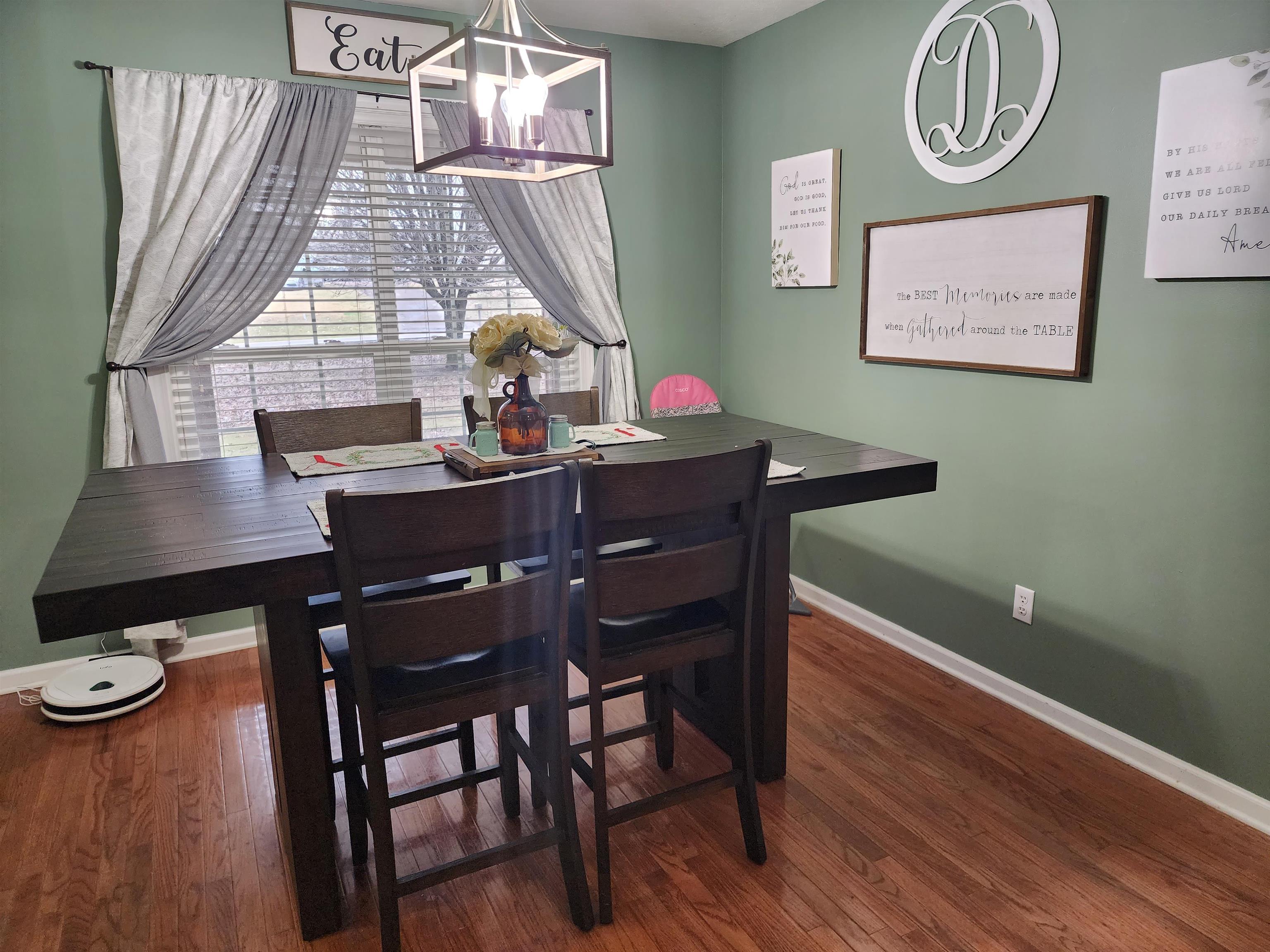 2316 Edith-Nankipoo Road Ripley, TN 38063 - Photo 4 of 12 a view of a dining room with furniture and wooden floor