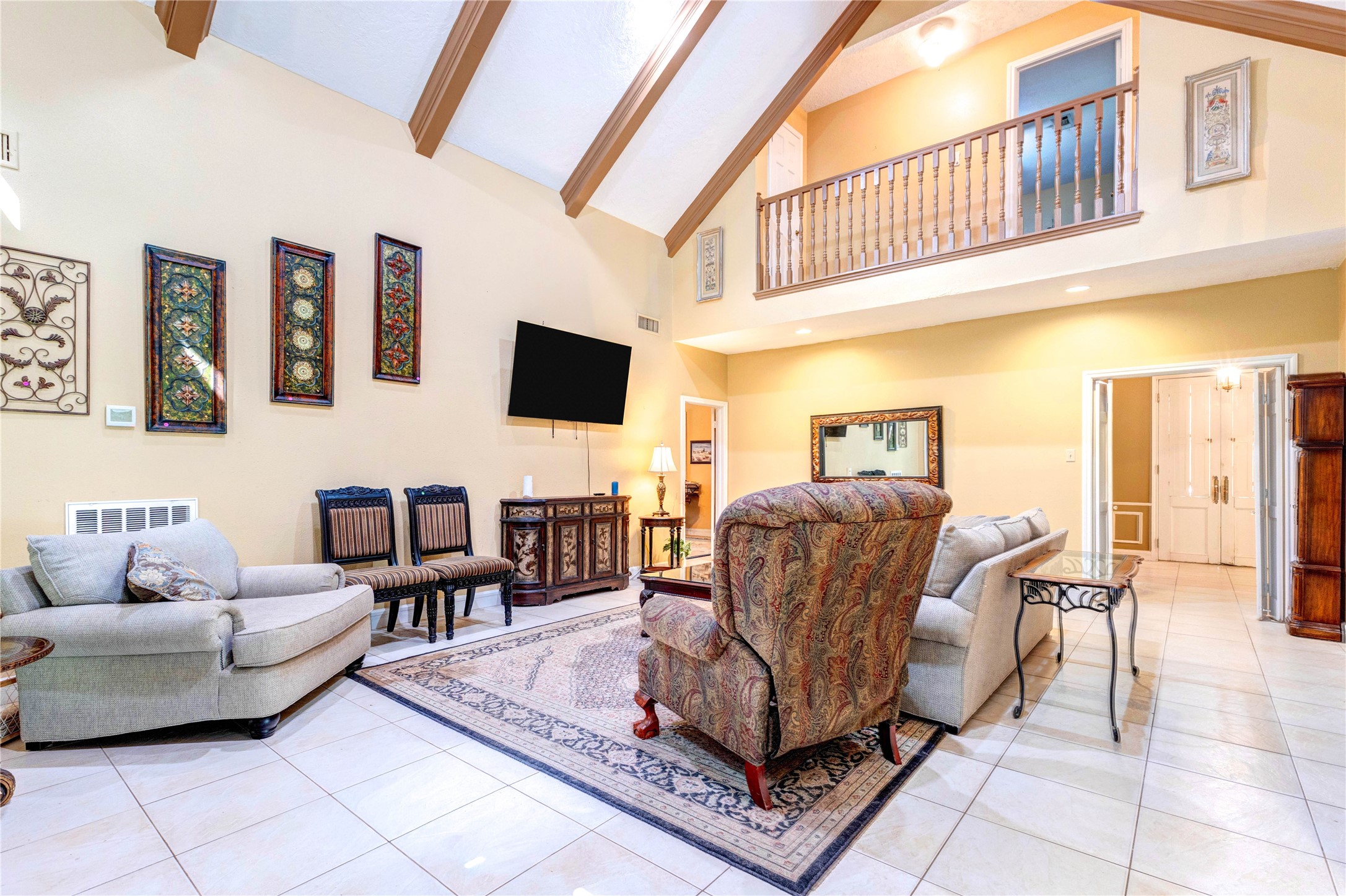 32037 Dobbin-Huffsmith Road Magnolia, TX 77354 - Photo 17 of 49 a living room with furniture and a flat screen tv