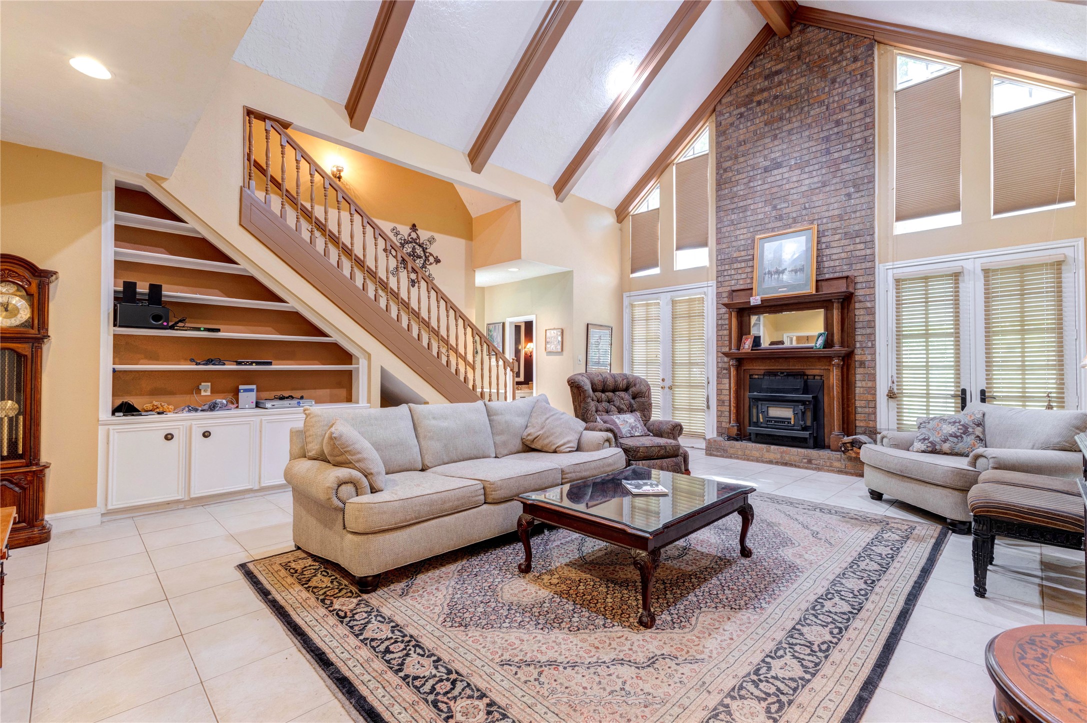 32037 Dobbin-Huffsmith Road Magnolia, TX 77354 - Photo 20 of 49 a living room with furniture and a fireplace