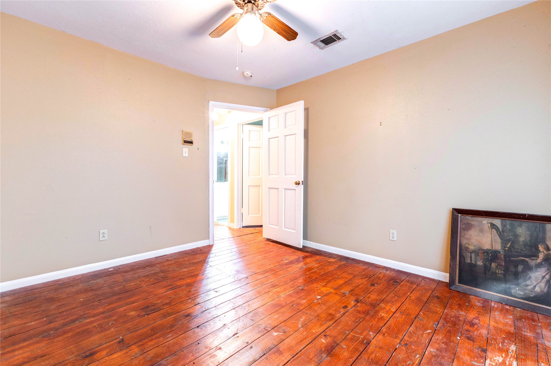 32037 Dobbin-Huffsmith Road Magnolia, TX 77354 - Photo 29 of 49 an empty room with wooden floor and windows