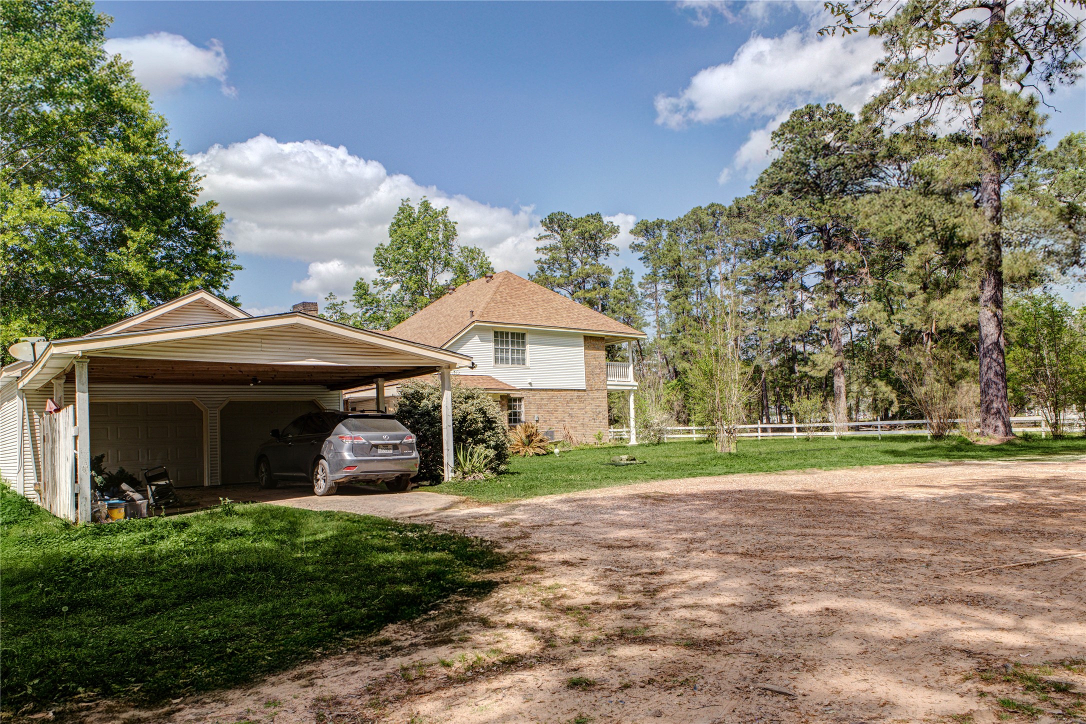 32037 Dobbin-Huffsmith Road Magnolia, TX 77354 - Photo 38 of 49 a front view of a house with a yard