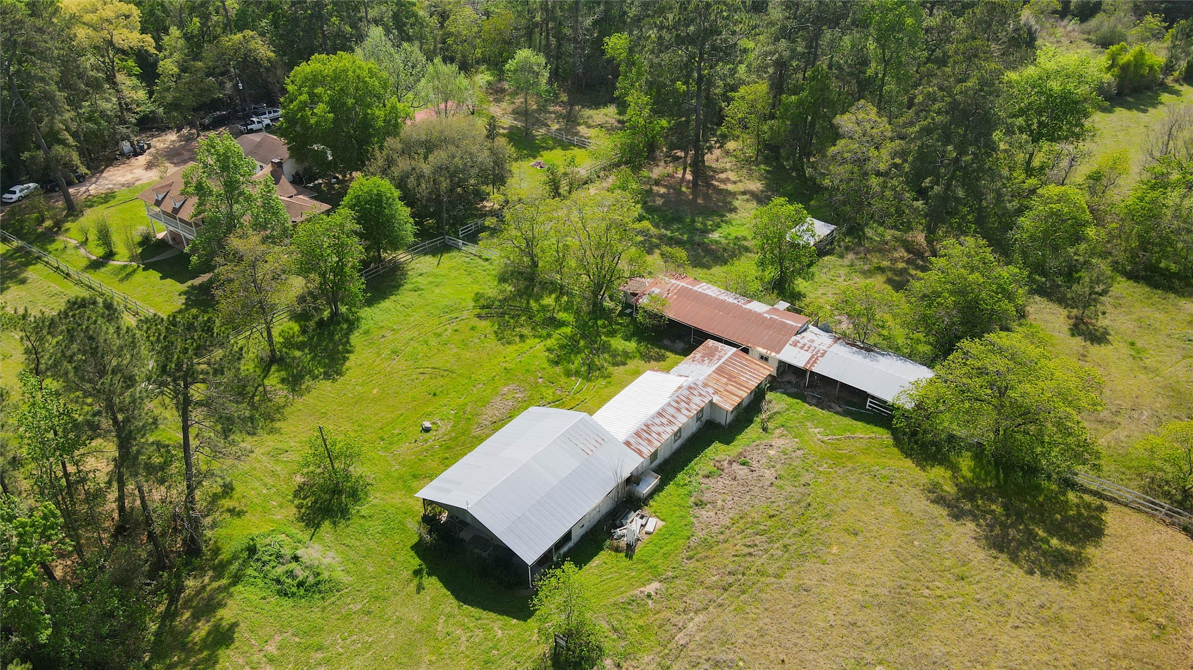 32037 Dobbin-Huffsmith Road Magnolia, TX 77354 - Photo 47 of 49 an aerial view of a house with a yard and lake view