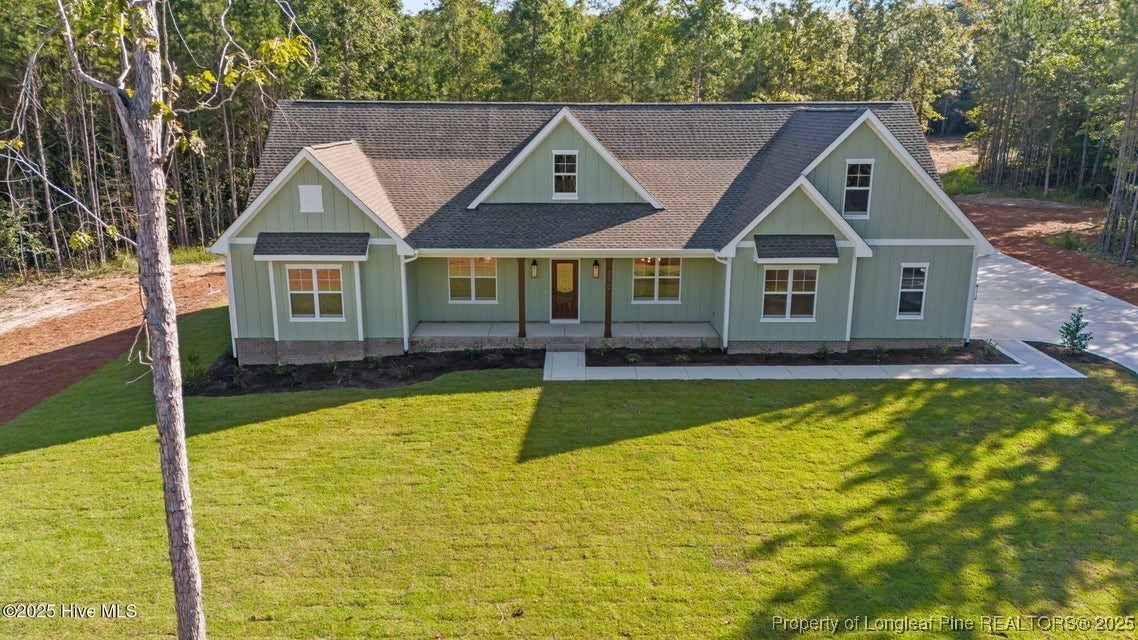 150 Hickory Pointer Way Cameron, NC 28326 - Photo 18 of 50 a front view of a house with swimming pool