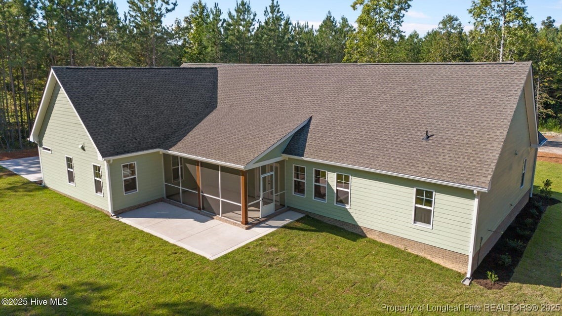 150 Hickory Pointer Way Cameron, NC 28326 - Photo 21 of 50 a aerial view of a house with yard and sitting area