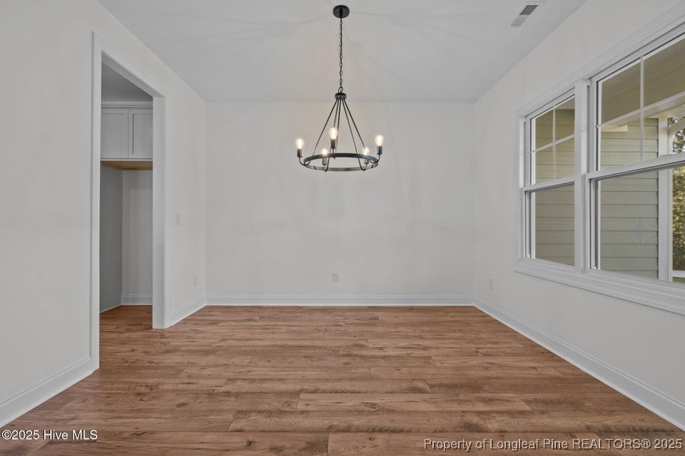 150 Hickory Pointer Way Cameron, NC 28326 - Photo 25 of 50 a view of a room with wooden floor and cabinet