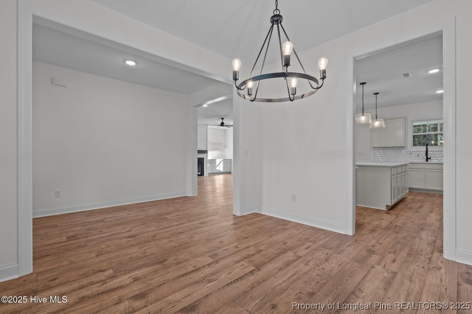 150 Hickory Pointer Way Cameron, NC 28326 - Photo 26 of 50 a view of a kitchen with wooden floor and a sink