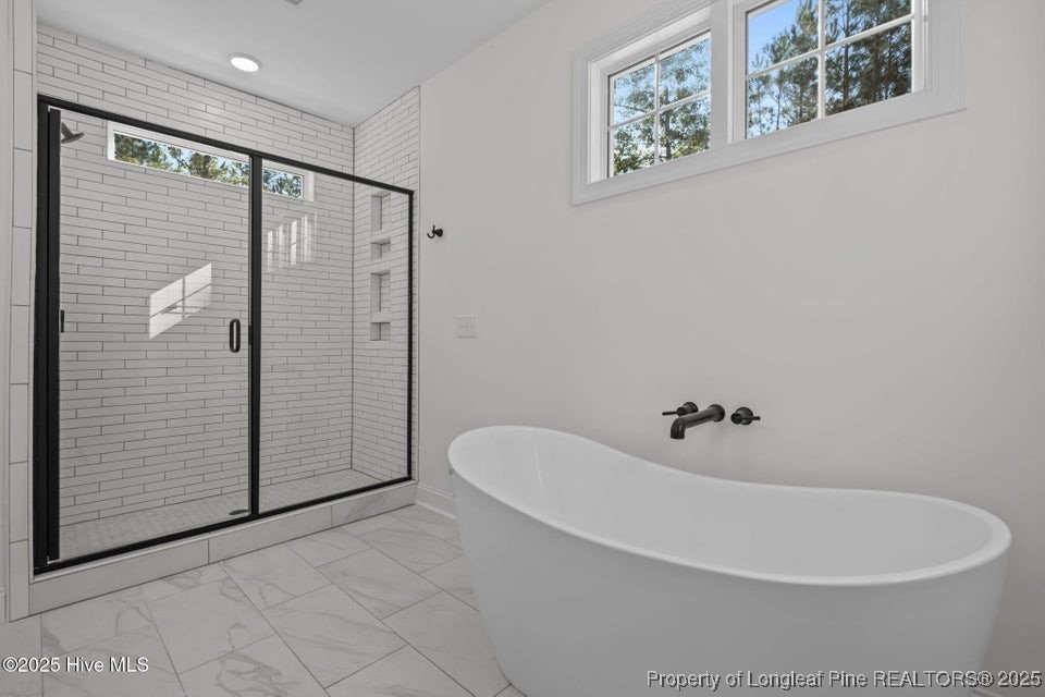 150 Hickory Pointer Way Cameron, NC 28326 - Photo 40 of 50 a white bath tub sitting next to a white wall