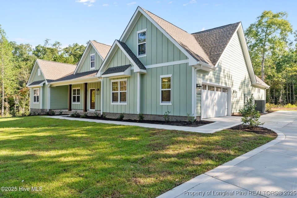 150 Hickory Pointer Way Cameron, NC 28326 - Photo 45 of 50 a view of a house with a swimming pool