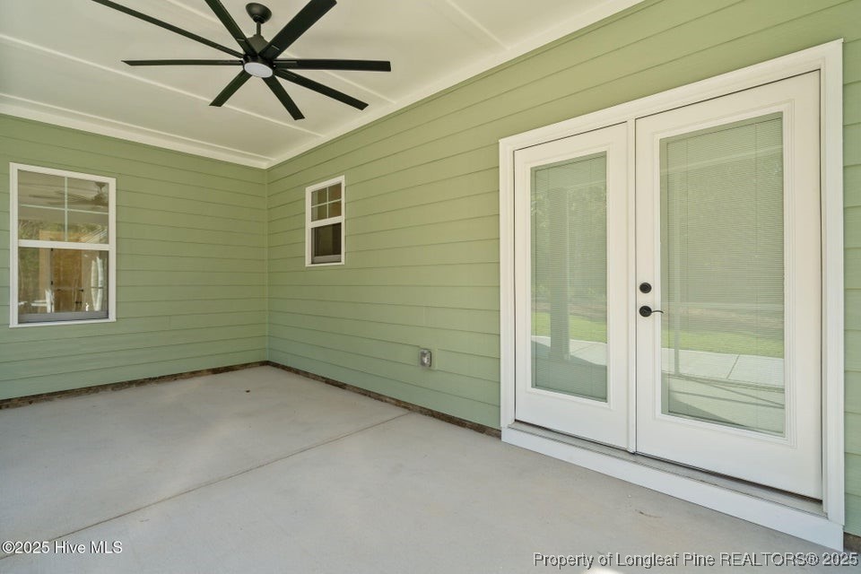 150 Hickory Pointer Way Cameron, NC 28326 - Photo 48 of 50 an empty room with closet and a chandelier fan
