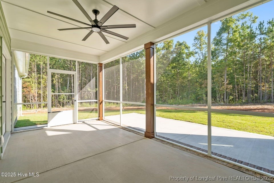 150 Hickory Pointer Way Cameron, NC 28326 - Photo 49 of 50 a view of an empty room with a floor to ceiling windows and a ceiling fan