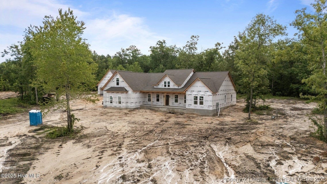150 Hickory Pointer Way Cameron, NC 28326 - Photo 15 of 50 a house with trees in the background