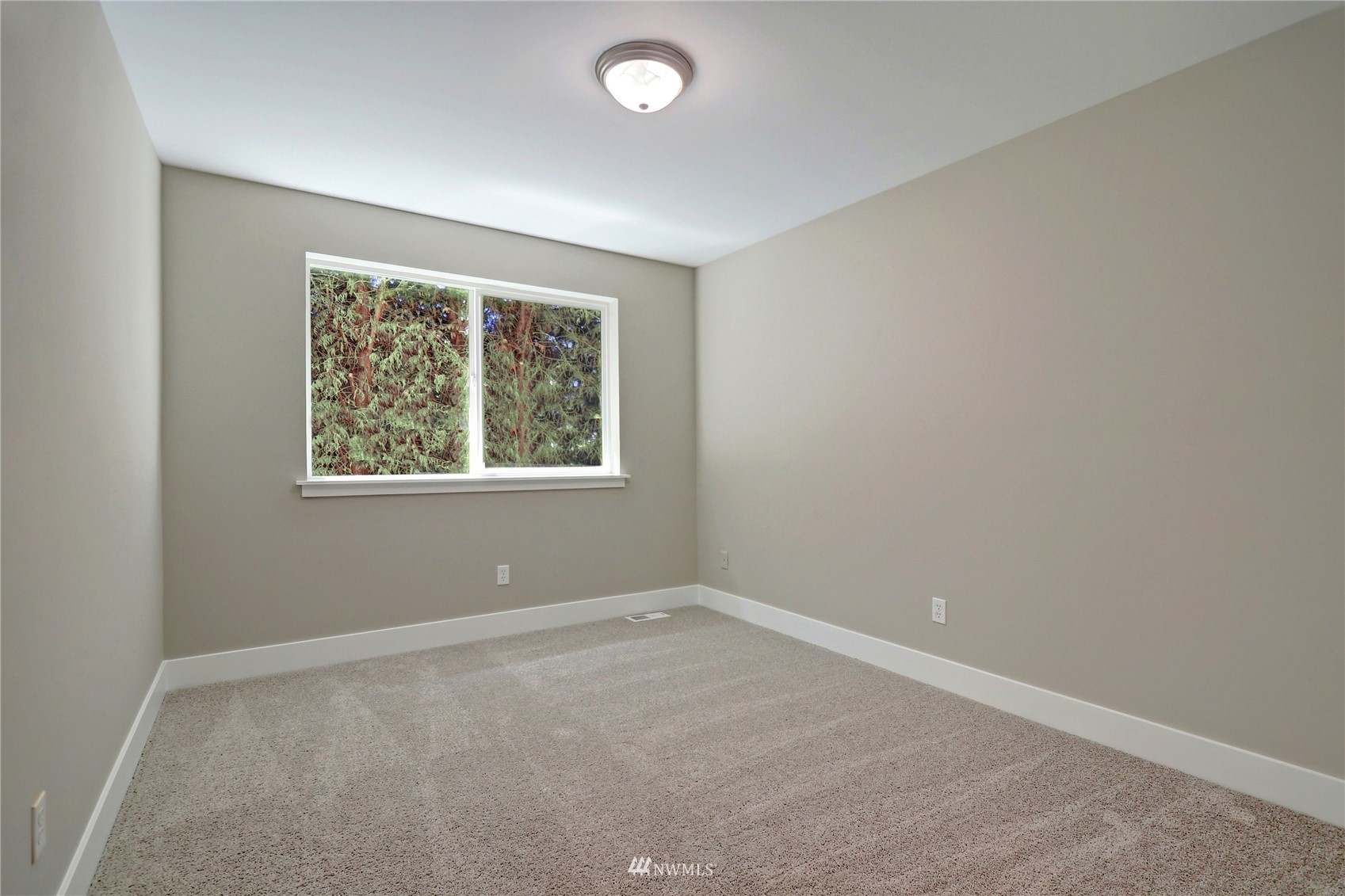 16 228th Street Southeast Bothell, WA 98021 - Photo 22 of 26 an empty room with windows