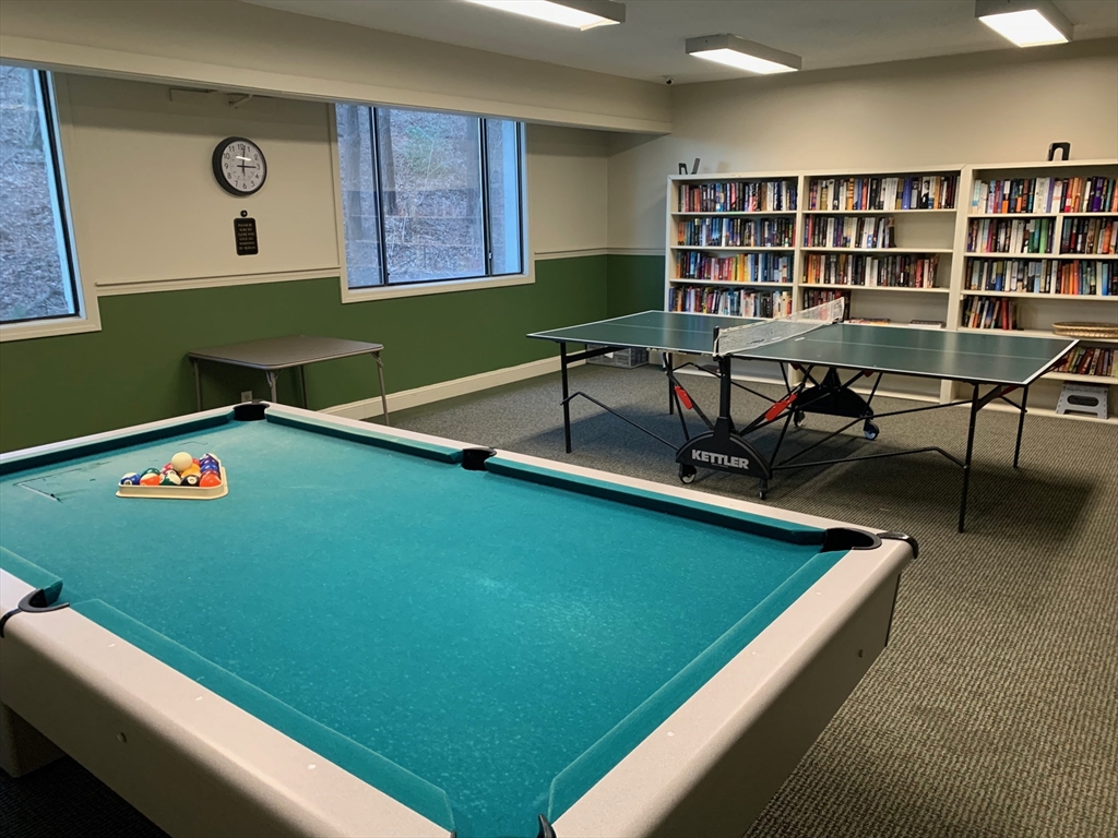 1500 Worcester Road, Unit 621 Framingham, MA 01702 - Photo 14 of 17 a room with pool table and windows