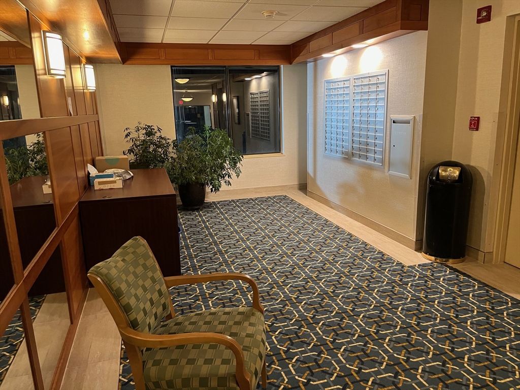 1500 Worcester Road, Unit 621 Framingham, MA 01702 - Photo 17 of 17 a view of two chairs in a patio