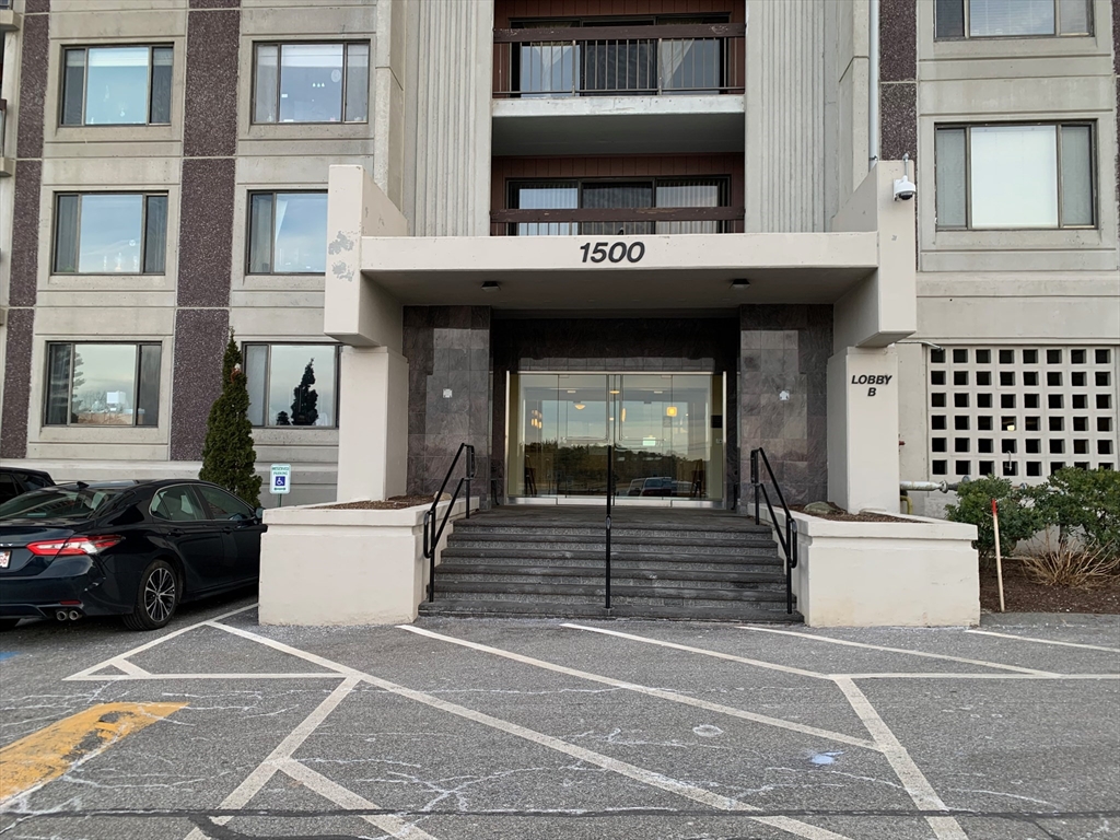 1500 Worcester Road, Unit 621 Framingham, MA 01702 - Photo 2 of 17 a view of a building with car parked