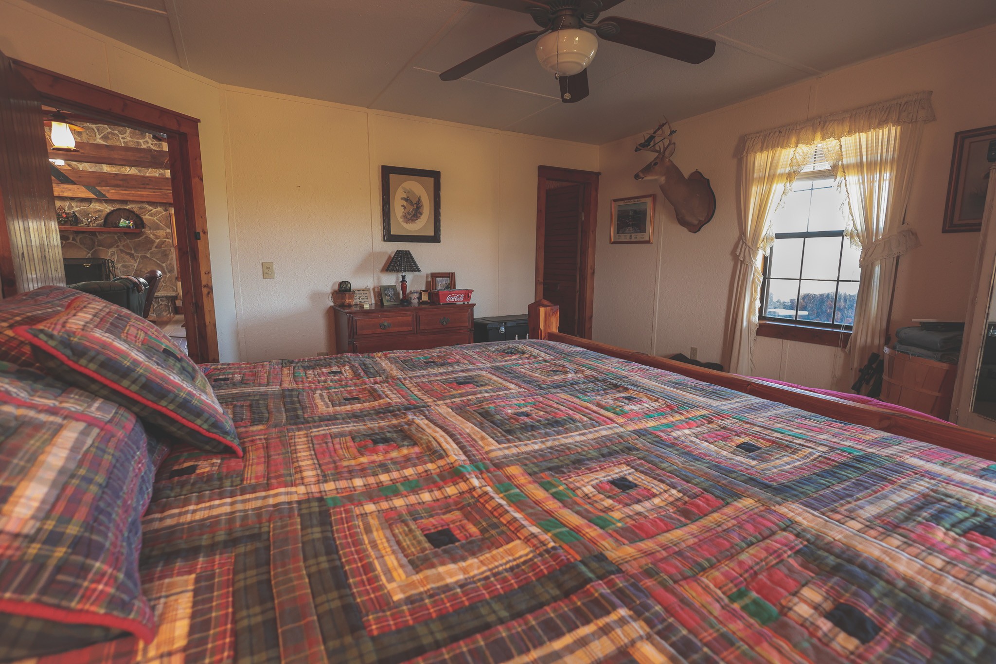 1047 Nelson Harrison Road Evensville, TN 37332 - Photo 55 of 100 a bedroom with a bed and a large window with the outer view