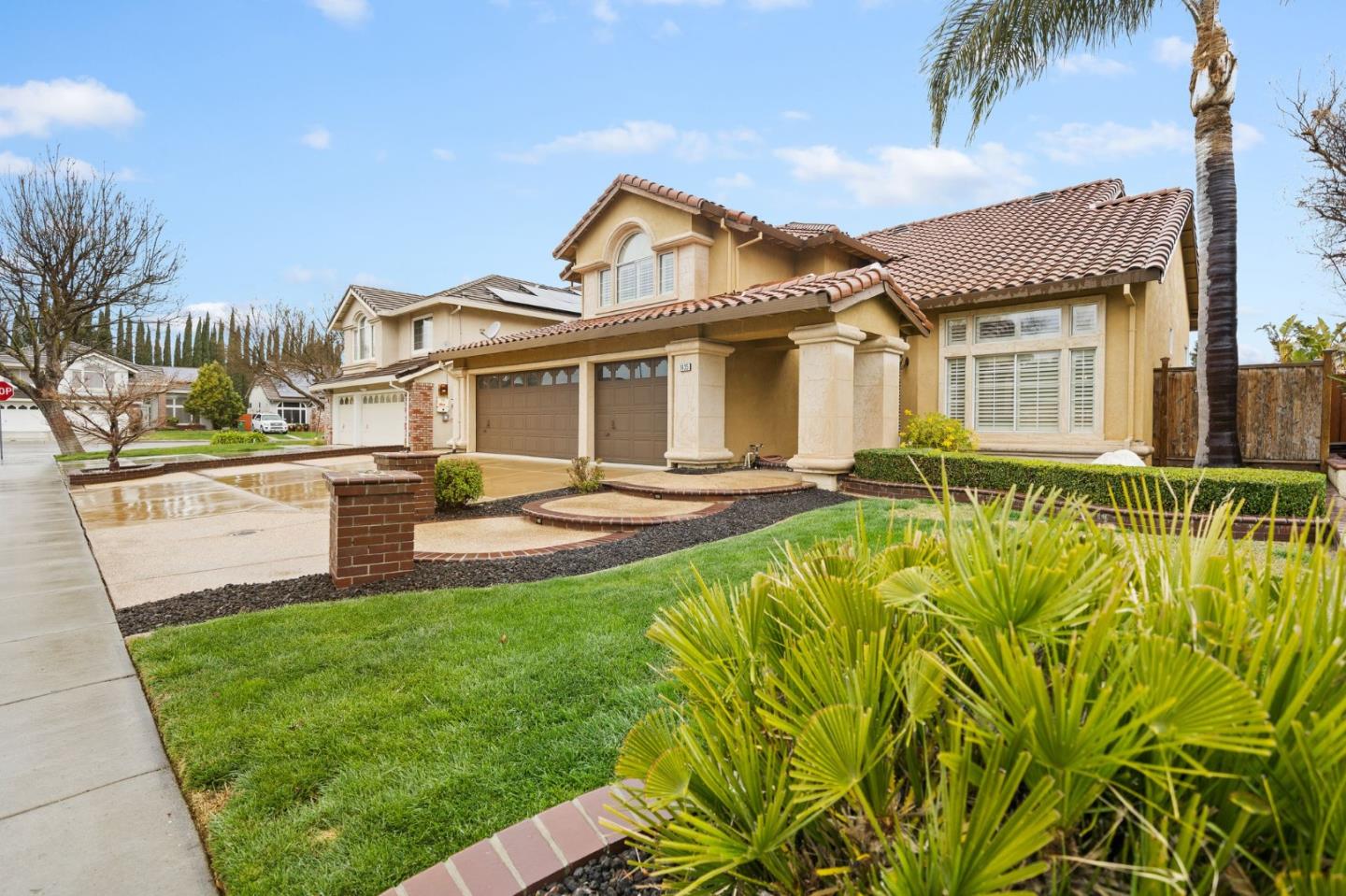 1435 Eagle Street Tracy, CA 95376 - Photo 1 of 24 a front view of a house with a garden