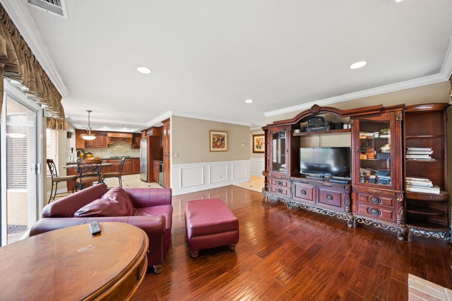 1435 Eagle Street Tracy, CA 95376 - Photo 12 of 24 a living room with furniture and a flat screen tv