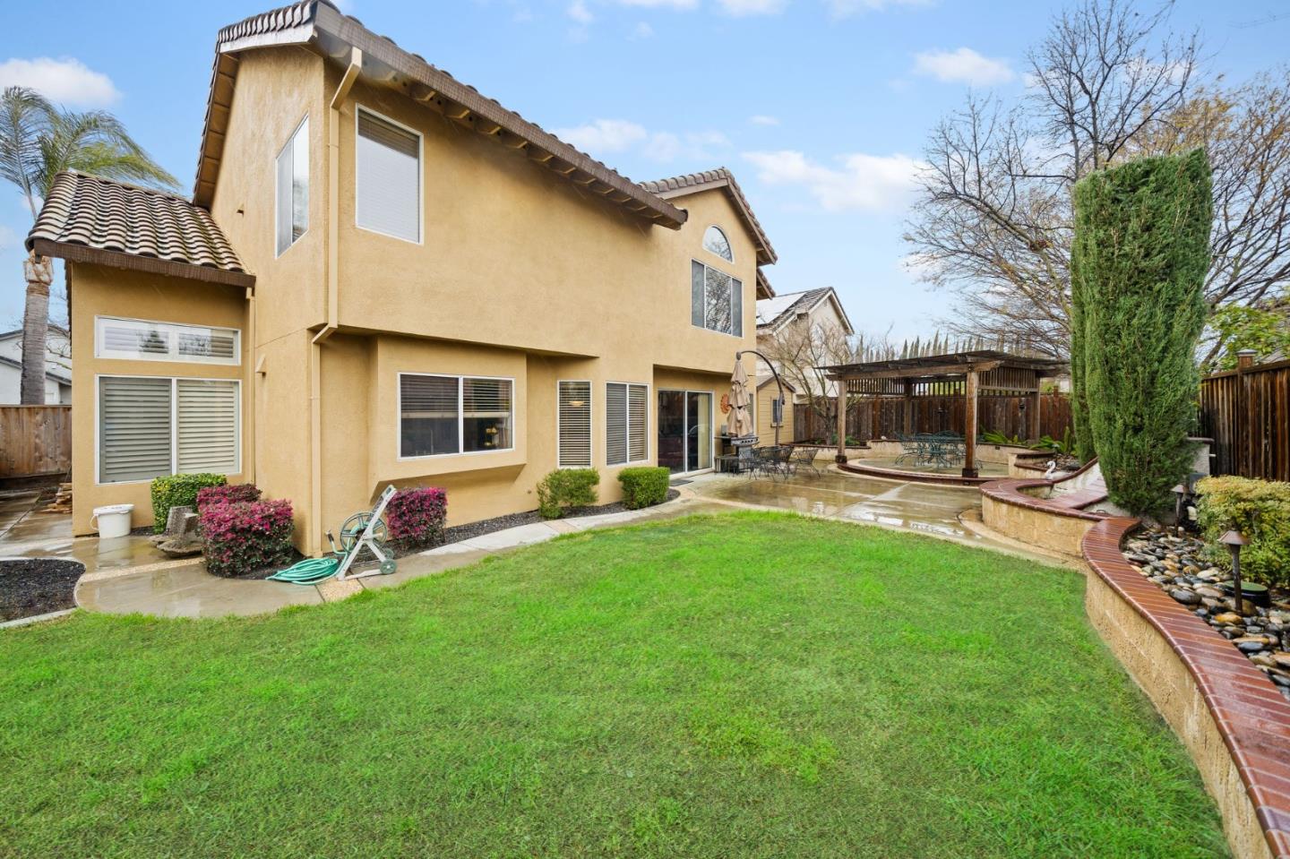 1435 Eagle Street Tracy, CA 95376 - Photo 24 of 24 a front view of house with yard and outdoor seating