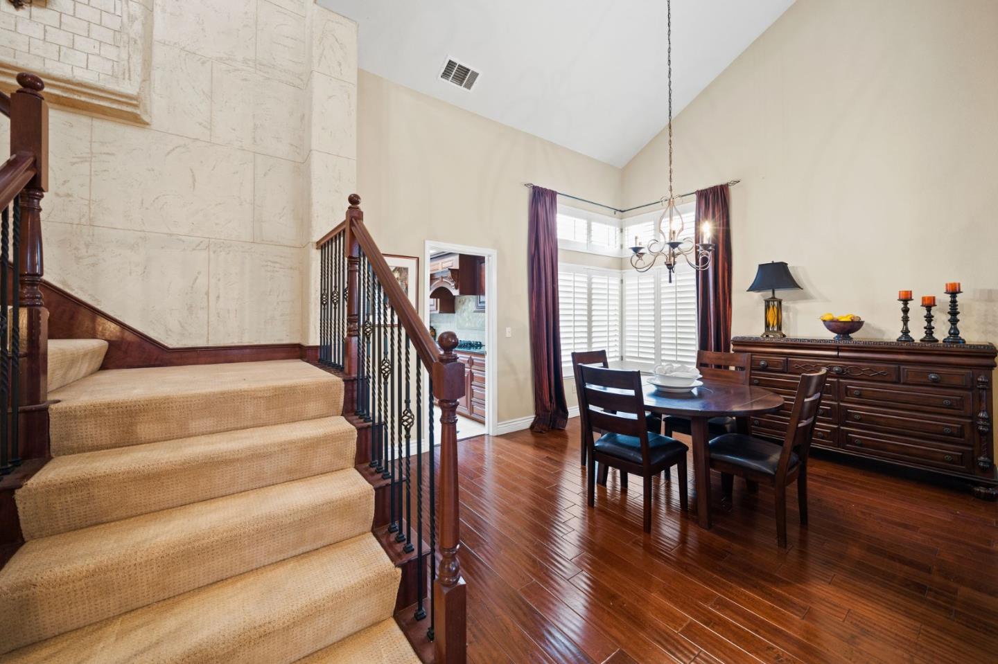 1435 Eagle Street Tracy, CA 95376 - Photo 4 of 24 a view of a dining room with furniture and wooden floor