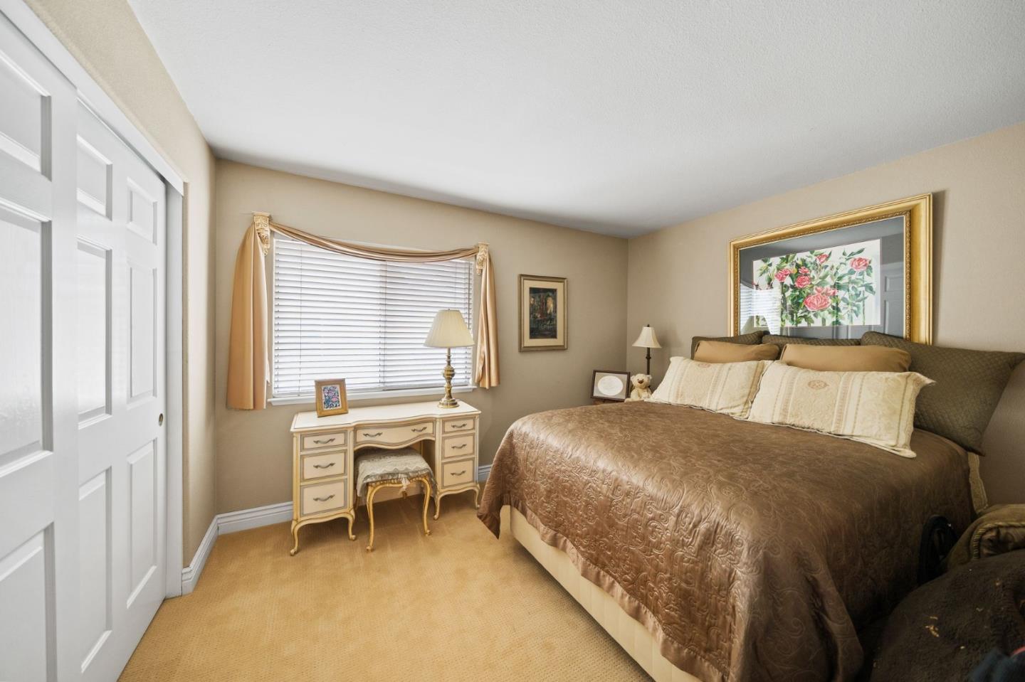1435 Eagle Street Tracy, CA 95376 - Photo 5 of 24 a bedroom with a bed and a window