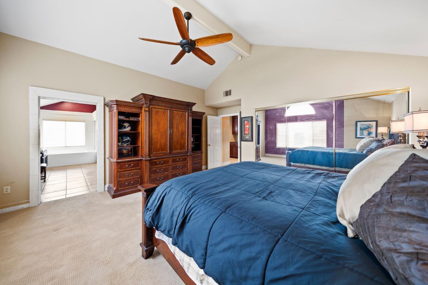 1435 Eagle Street Tracy, CA 95376 - Photo 8 of 24 a bed room with a bed and a ceiling fan