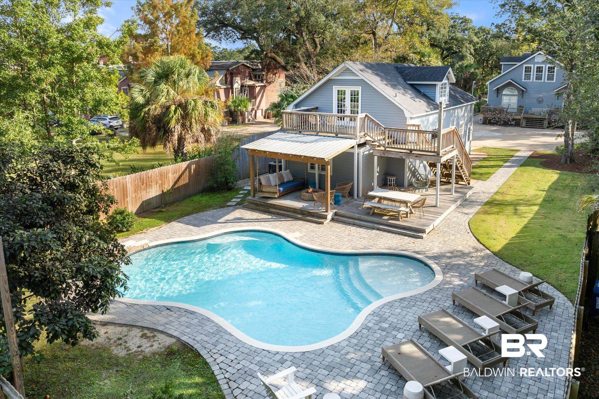 1210 Government Street Mobile, AL 36604 - Photo 3 of 37 View of pool with a patio, a deck, and a yard