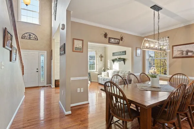 a view of swimming pool outdoor seating and city view