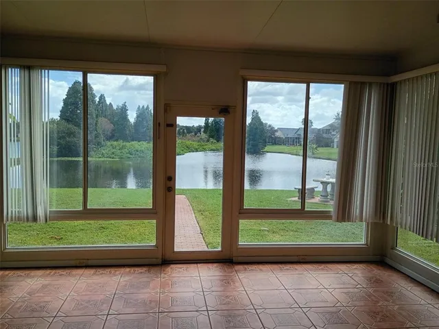 a view of porch with a floor to ceiling window