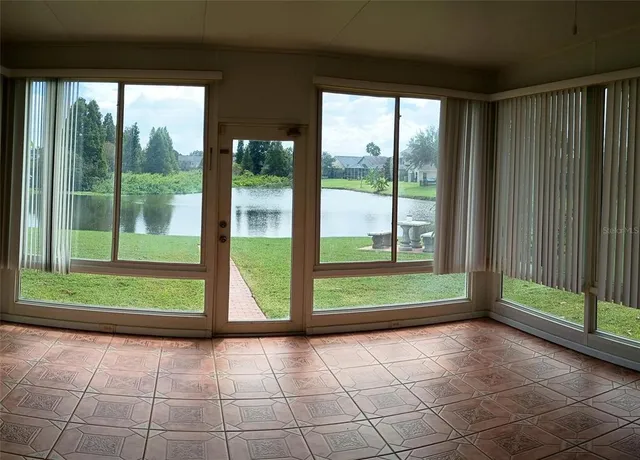 a view of backyard with green walls