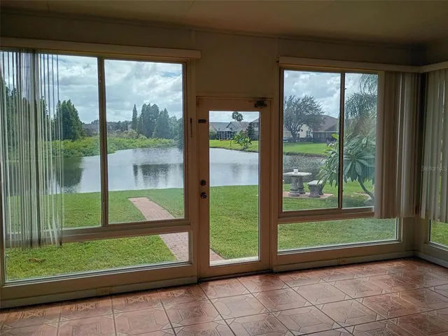 a view of a lake with a big yard