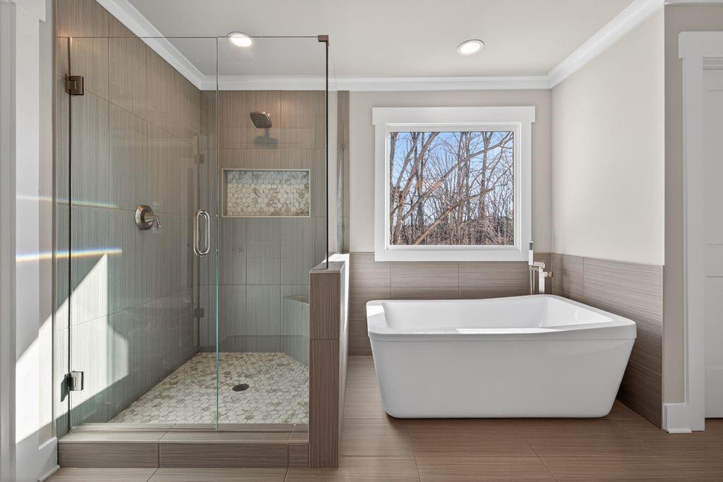 4947 Old Orr Road Flowery Branch, GA 30542 - Photo 42 of 60 a white tub sitting next to a window