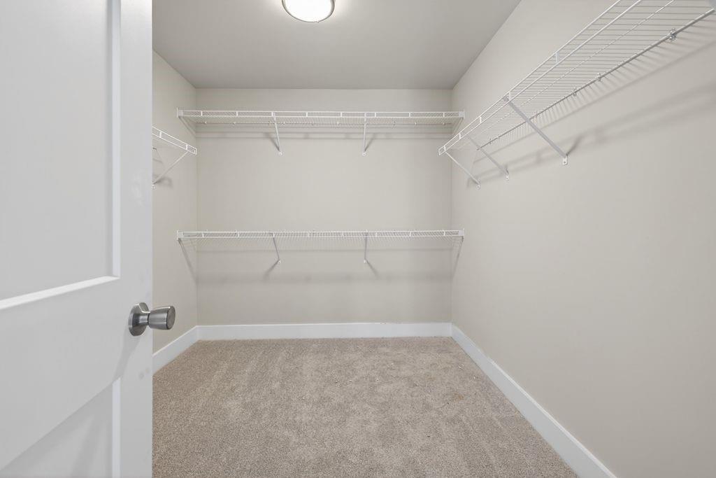 4947 Old Orr Road Flowery Branch, GA 30542 - Photo 46 of 60 a view of a room with racks on the wall