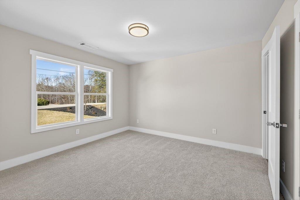 4947 Old Orr Road Flowery Branch, GA 30542 - Photo 47 of 60 an empty room with a window