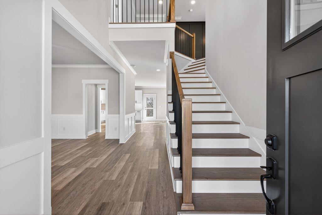 4947 Old Orr Road Flowery Branch, GA 30542 - Photo 5 of 60 a view of a hallway with wooden floor and entryway