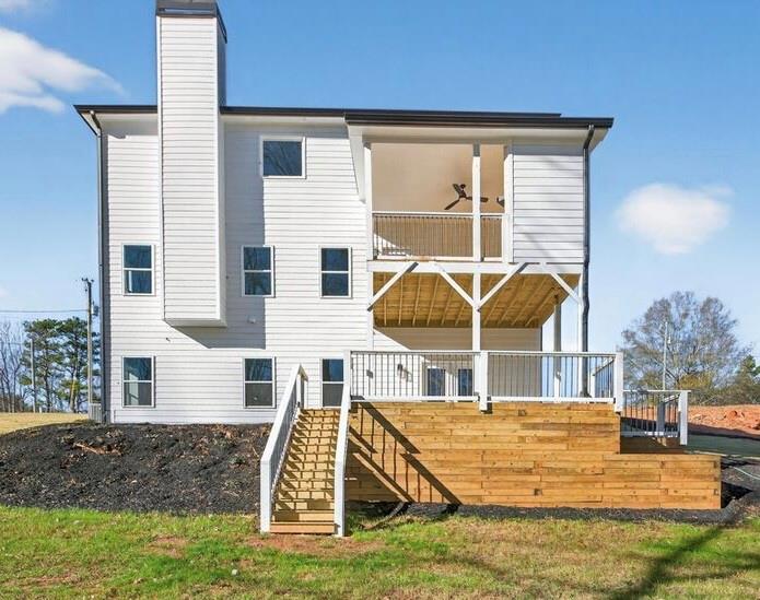 4947 Old Orr Road Flowery Branch, GA 30542 - Photo 58 of 60 a view of a house with a backyard