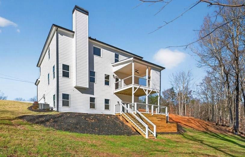 4947 Old Orr Road Flowery Branch, GA 30542 - Photo 59 of 60 a view of a house with a backyard