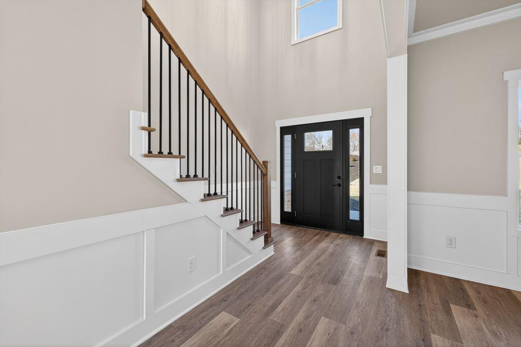 4947 Old Orr Road Flowery Branch, GA 30542 - Photo 6 of 60 a view of a hallway with wooden floor and entryway