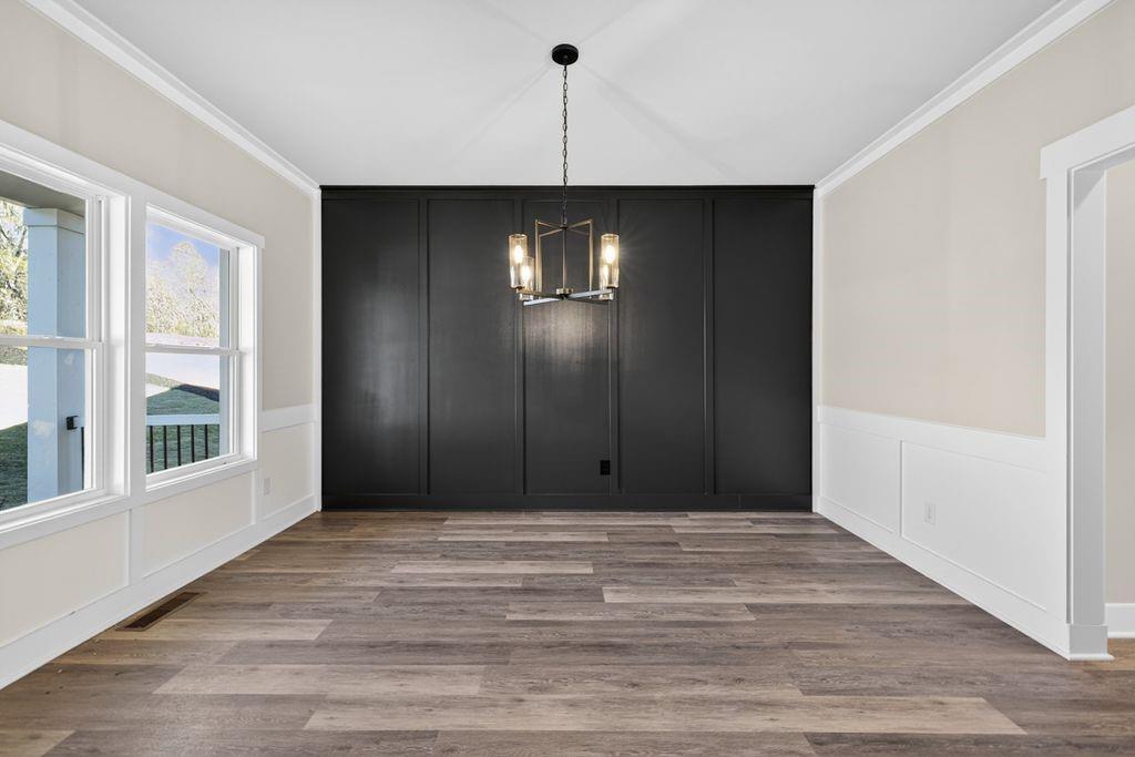 4947 Old Orr Road Flowery Branch, GA 30542 - Photo 9 of 60 a view of an empty room with a window