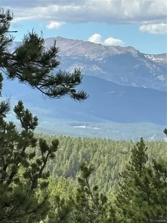 a view of lake with mountain