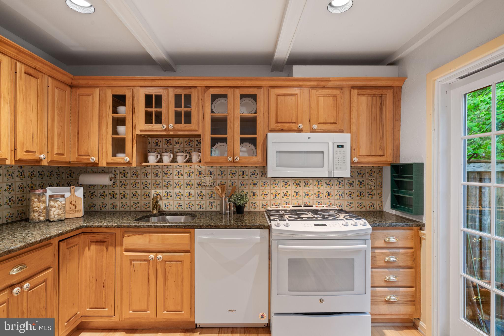 2375 Albot Road Reston, VA 20191 - Photo 22 of 63 Gas cooking and glass front cabinetry