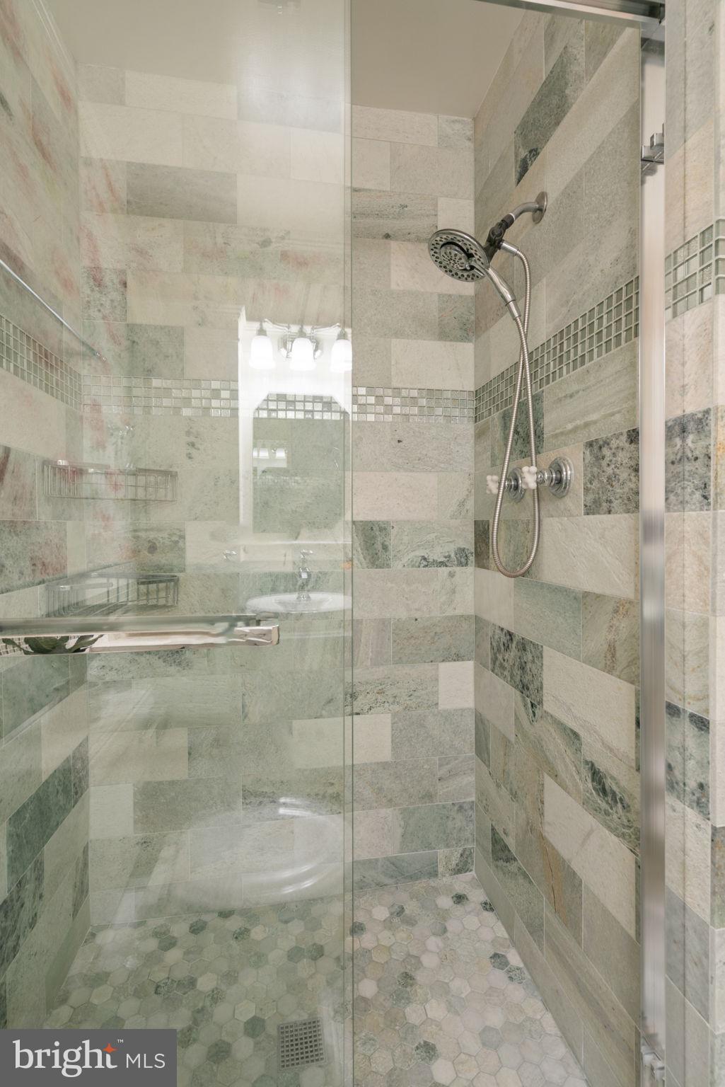 2375 Albot Road Reston, VA 20191 - Photo 37 of 63 Creative tile work in primary bathroom