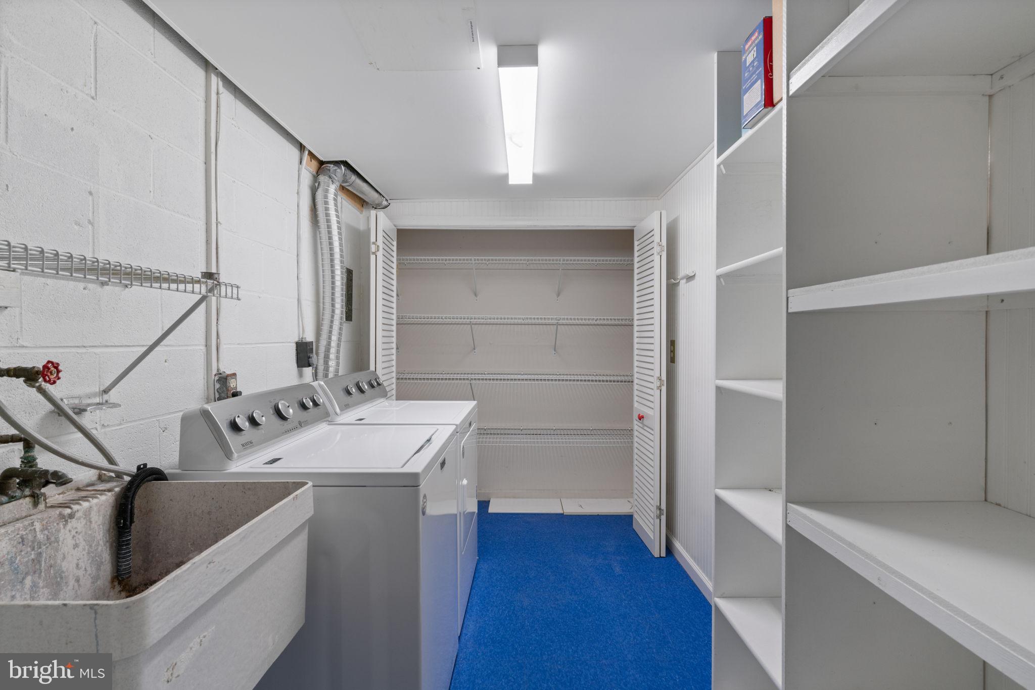 2375 Albot Road Reston, VA 20191 - Photo 55 of 63 Laundry room with storage and sink