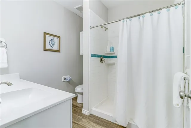 a bathroom with a sink and toilet