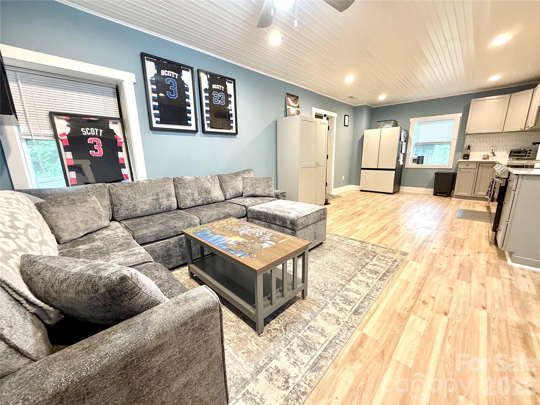 153 Arrowood Corner Road Mars Hill, NC 28754 - Photo 12 of 34 a living room with furniture and kitchen view