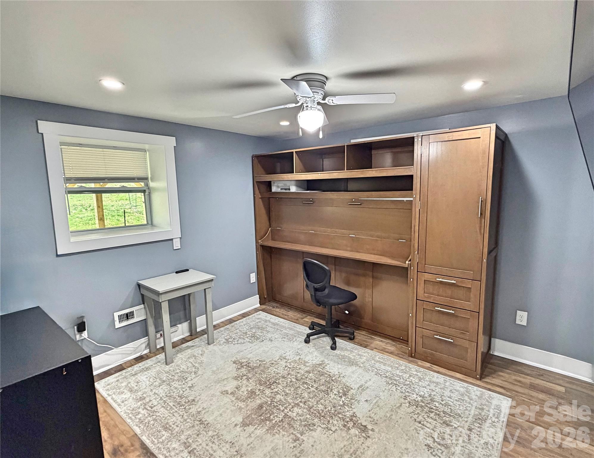 153 Arrowood Corner Road Mars Hill, NC 28754 - Photo 21 of 34 a view of a workspace with furniture