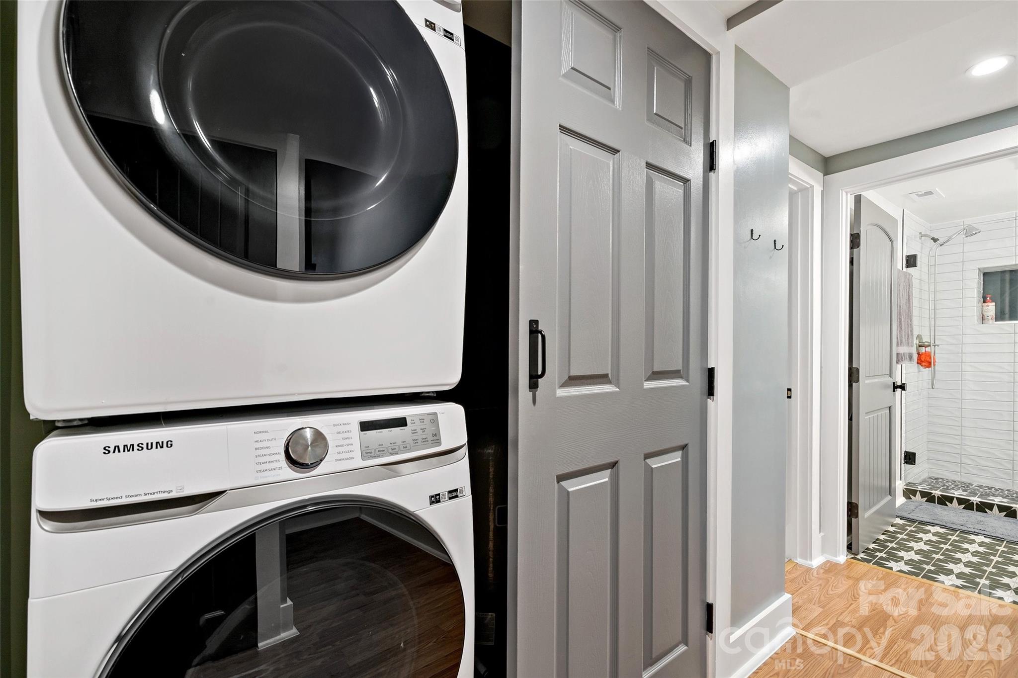 153 Arrowood Corner Road Mars Hill, NC 28754 - Photo 23 of 34 a view of washer and dryer in a utility room