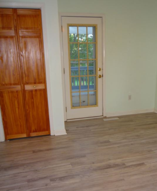 109 Lake Ridge Circle Walhalla, SC 29691 - Photo 15 of 27 A glass exterior door opens to the back deck from this versatile living space.