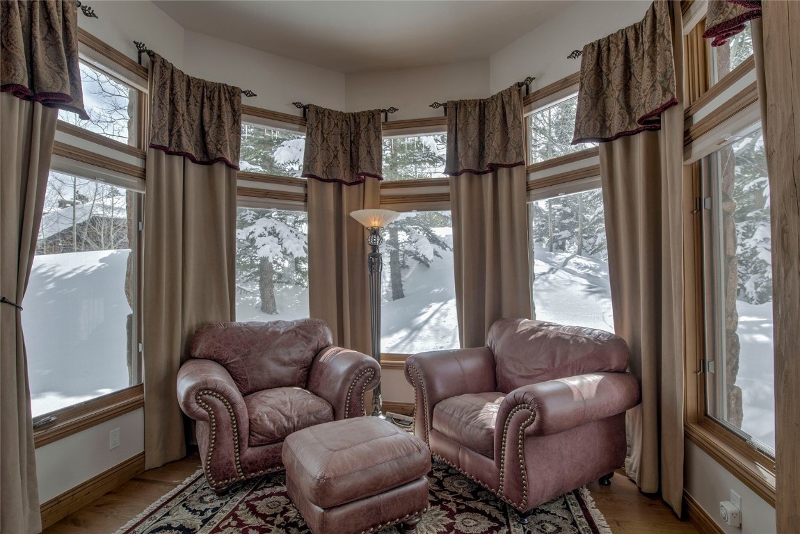 68 Snowy Ridge Road Breckenridge, CO 80424 - Photo 11 of 42 a living room with furniture and a large window