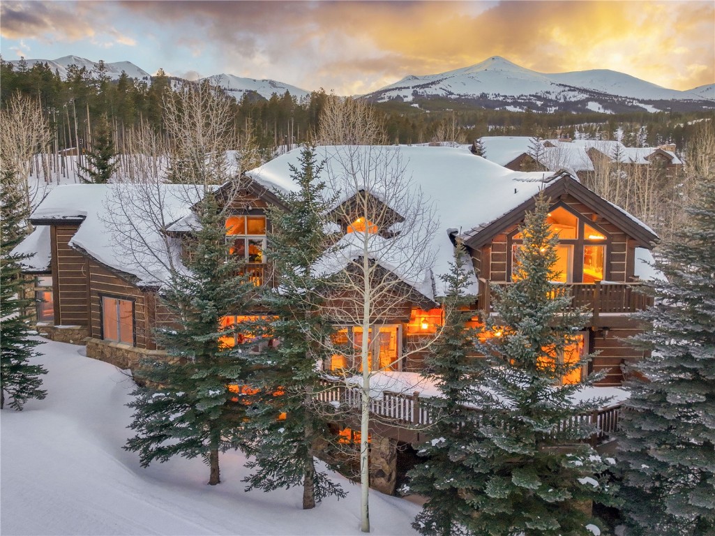 68 Snowy Ridge Road Breckenridge, CO 80424 - Photo 3 of 42 an aerial view of houses with a lake and mountain view